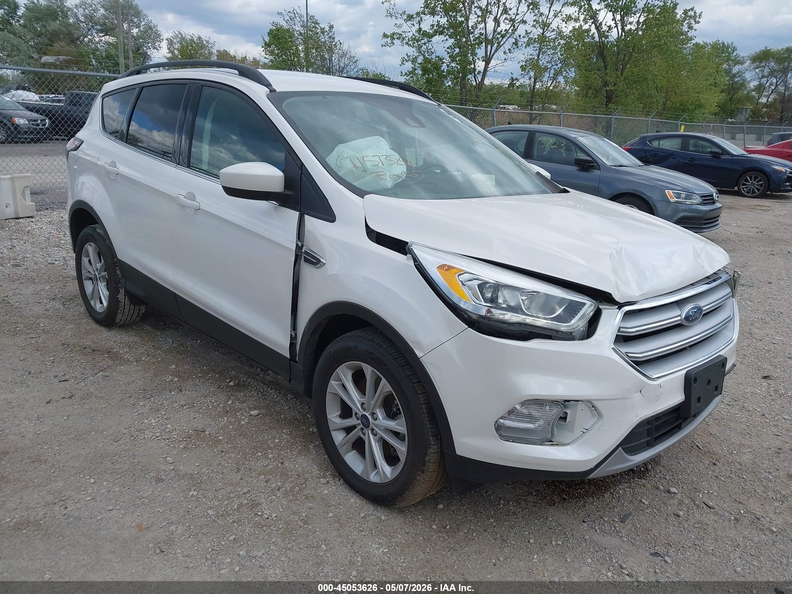 2018 FORD Escape — VIN 1FMCU9HDXJUB21525 — photo 1 of 16